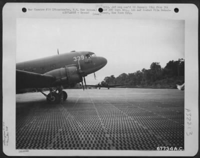 Thumbnail for Consolidated > Douglas C-47's on the landing strip at Finschhafen, N.E. New Guinea, after bringing supplies to a fighter group. 18 December 1943.