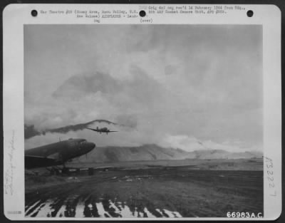 Thumbnail for Consolidated > Douglas C-47, transport plane coming in from Port Moresby. All supplies and personnel have been brought in by air with the sole exception of one land convoy from Lae. This latter proved very inadequate as a means of supplying the area. New Guinea