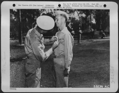 Thumbnail for Consolidated > General Ennis C. Whitehead pinning Purple Heart on Lt. Col. Richard R. Barden. NEW GUINEA.