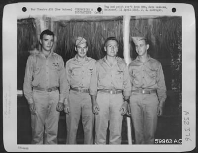 Thumbnail for Consolidated > Each of these four P-38 Lightning pursuit pilots was awarded the Air Medal by Brig. General Paul B. Wurtsmith at ceremonies held at an advanced air base in New Guinea. The award was presented in recognition of their participation in 25 or more