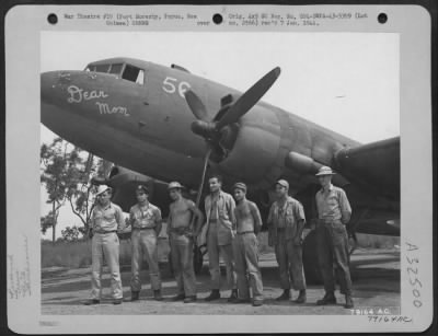 Thumbnail for Consolidated > C-47 transport plane, "Dear Mom" and its crew from the 6th Troop Carrier Sq. 5th Air Force, Wards Drome, Port Moresby, New Guinea. Left to right, 2nd Lt. George W. Beaver, Warren, Ohio, pilot; 2nd Lt. Hubert S. Bronson, Hastings, Mich, co-pilot