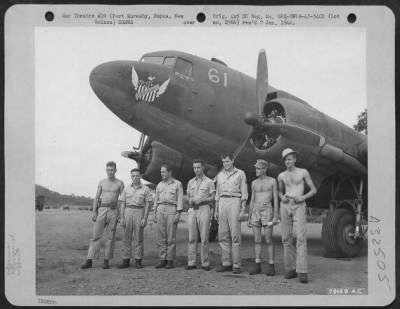 Thumbnail for Consolidated > C-47 transport plane and its crew from 6th Troop Carrier Sq. 5th Air Force, Wards Drome, Port Moresby, New Guinea. Pvt. Gilbert L. Runnels, St. Paul, Minn., Engr; 2nd Lt. Edward M. Silsby, Reno, Nevada, pilot; 2nbd Lt. Wilbur Weedin, Aurora, Neb.