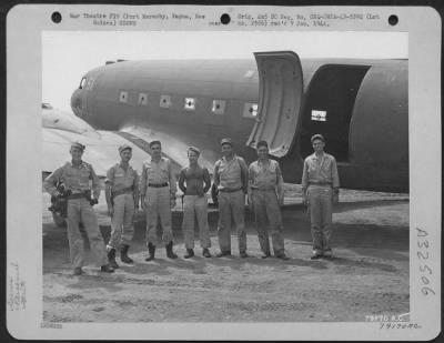 Thumbnail for Consolidated > C-47 transport plane and crew from the 6th Troop Carrier Sq. 5th Air Force, Wards Drome, Port Moresby New Guinea. Left to right: 2nd Lt. Wade McFarland, Natchitoches, La., pilot; 2nd Lt. Thomas G. Thompson Boaz, Ala., co-pilot; Sgt. Lyle G. McMann