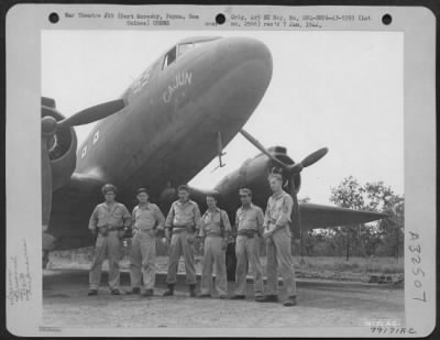 Thumbnail for Consolidated > C-47 transport plane "Cajun" and its crew from 6th Troop Carrier Sq., 5th Air Force Wards Drome, Port Moresby, New Guinea. Left to right: Lt. Albert Burleigh, Sunset La., pilot; Lt. Eugene Rogers, Newark, Ohio, co-pilot; T/Sgt. John M. Stofocik