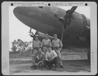 Thumbnail for Consolidated > C-47 transport plane "Irene" and its crew from 6th Troop Carrier Sq. 5th Air Force, Wards Drome, Port Moresby, New Guinea. Left to right, Front row: Pvt. John Mullally of Utica, Neb., Ass't Engr; T/Sgt. Amerigo Grassi, Erie, Pa. Engr; 2nd row: 2nd