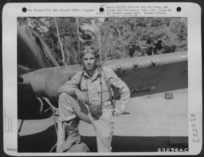 Thumbnail for Consolidated > Joe King of the 49th Fighter Group beside his plane at an air base somewhere in New Guinea.