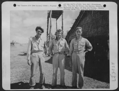 Thumbnail for Consolidated > Each man of this trio of American Bell P-39 Airacobra fighter pilots got an enemy plane to help boost the total bag to 23 destroyed Japanese fighters and bombers when an armada of Nipponese aircraft attempted a raid February 6, on Wau in New Guinea.