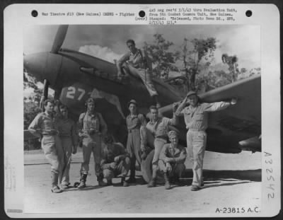 Thumbnail for Consolidated > Members of the 49th Fighter Group pose beside a Curtiss P-40 at an air base in Buna, New Guinea. They are, left to right: Robert V. McHale Harry B. Dillworth Joe King Lucius D. LaCroix Arland Stanton Clyde Knisley Paul J. Slocum David Baker