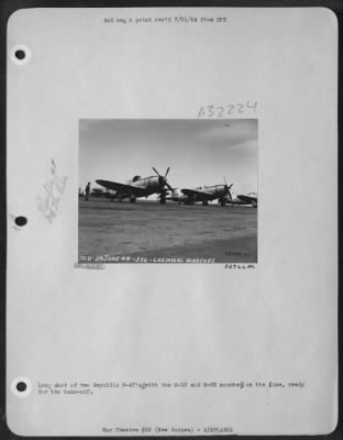 Thumbnail for Consolidated > Long shot of two Republic P-47's (with the M-10 and M-33 mounted) on the line, ready for the take-off.