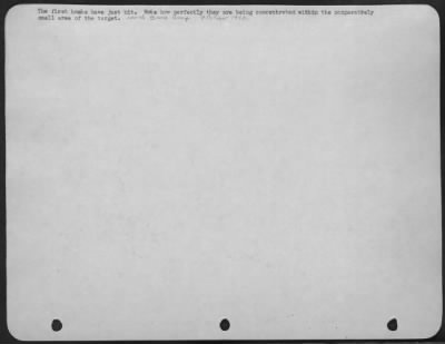 Consolidated > The first bombs have just hit. Note how perfectly they are being concentrated within the comparatively small area of the target. 100th Bomb Group. 9 October 1943.