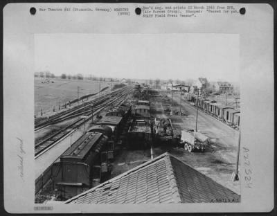 Thumbnail for Consolidated > The railroad yard at Stommeln, Germany, after an attack by fighter-bombers of the 9th AF. Similar attacks by Republic P-47 Thunderbolts of the 9th three TAC serve to halt or delay rail-borne movements of supplies and reinforcements to enemy troops