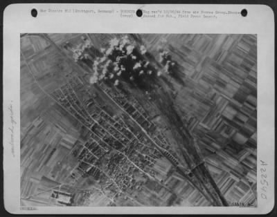 Thumbnail for Consolidated > Boeing B-17 Flying Fortresses of the 8th Air Force score direct hits on Stuttgart marshalling yards during the 16 Dec 44 attack. Although the picture shows clear visibility, the target was obscured by cloud when the bombardiers released their bombs