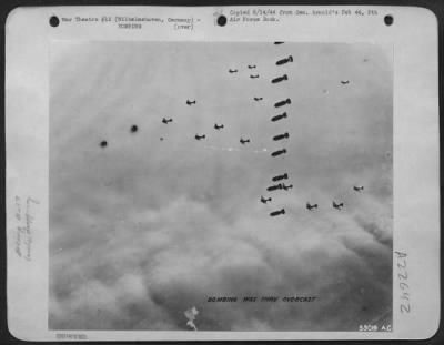 Thumbnail for Consolidated > Bombing thru overcast at Wilhelmshaven, Germany, by Boeing B-17s.