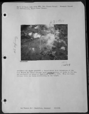 Thumbnail for Consolidated > Synthetic Oil Plant Attacked -- Consolidated B-24 Liberators Of The Us 8Th Air Force Dropped Heavy Concentrations Of Bombs On The German Synthetic Oil Plant At Madgeburg, Germany, March 3 1945.  This Low Angle Oblique Shows The Bombs Mushrooming On The Ta