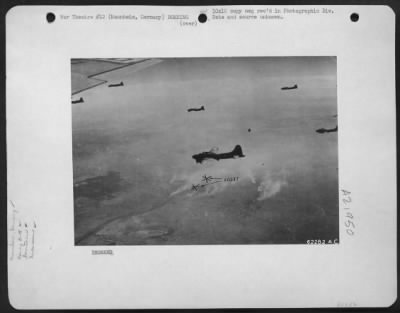 Thumbnail for Consolidated > Boeing B-17 Flying Fortresses Approaching The Target Area At Mannheim - Ludwigshaven, Germany On 14 Oct. 1943.  Position Of Cross Marks Are Approx. In The Center Of The Target Area.  Note Smoke Screen.