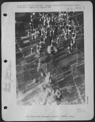 Consolidated > Bombs Away, And How -- Fragmentation Bombs, Part Of The Heavy Load That Was Let Loose On The Memmingen Airdrome In Southern Germany By Boeing B-17 Flying Fortresses Of The 15Th Aaf, Are Shown Here On The Way To The Target During The Heavy Bomber Attack Of