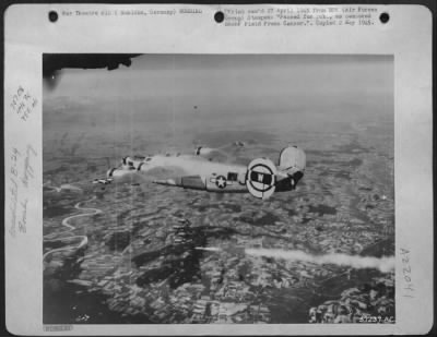 Thumbnail for Consolidated > Bombs Away -- Missiles For The Transportation Facilities Of Muhldorf, Germany Go Down From A Consolidated B-24 Liberator.