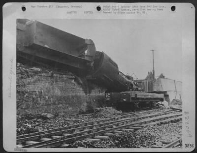 Thumbnail for Consolidated > One Of The Many Overturned Engines And Uprooted Rails Which Advancing Allied Armies Found At The Railway Marshalling Yards At Munster, Germany.