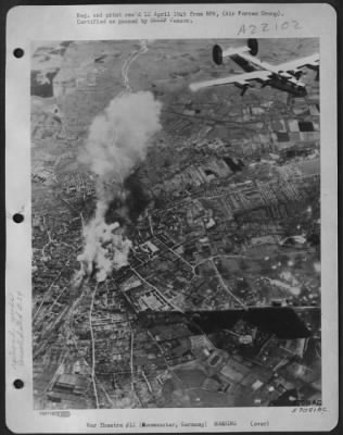 Thumbnail for Consolidated > The Railway Marshalling Yards At Neumunster, Germany, Key Rail Center Between Hamburg And Kiel, Burn As A Us 8Th Af Consolidated B-24 Liberator Circles Away From The Target After Dropping Its Bombs.  The 2Nd Air Division Liberators, Part Of A Force Of 130