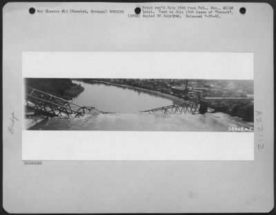 Thumbnail for Consolidated > Blasted Bridges Reflect The Fury Of Allied Attack And The Swiftness Of German Retreat In Western Germany.  Goering Bridge At Neuwied, Germany Sags In The Rhine After 9Th Af Attacks.