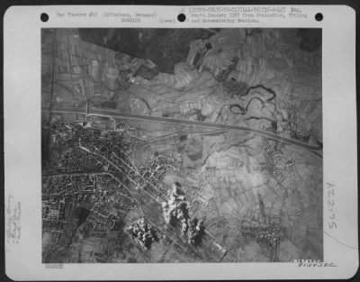 Consolidated > Bombs Burst On The Rail Marshalling Yards At Offenburg, Germany During A Mission By Planes Of The 320Th Bomb Group, 444Th Bombardment Squadron On Feb. 15, 1945.