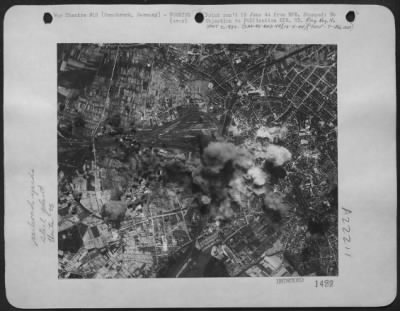 Thumbnail for Consolidated > Forts Maul Rail Center -- Bombs From Boeing B-17 Flying Fortresses Strike The Marshalling Yards At Osnabruck As Us 8Th Aaf Heavies Attacked 13 May 44.  Smoke From A Nearby Steel Plant Can Be Seen Rising As The American Bombs Take Their Toll.  Hits Were Al