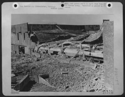 Thumbnail for Consolidated > The Roof End And Two Floors Of This Building In The Kugelfischer Plant At Schweinfurt, Germany, Have Dropped On Precision Machinery, Observers Found When Making A Survey Of Bomb Damage Close Behind Advancing Allied Ground Forces.