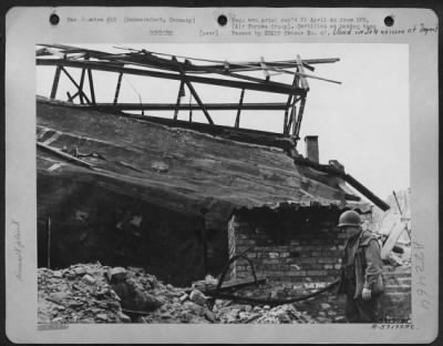 Thumbnail for Consolidated > Bearing Manufacture, An Ultra-Precision Industry Was Found By American Observers To Be Reduced To Relative Primitive Housing.  A Tarpaulin, Weighted With Bricks (Above And Left Of Soldiers Helmet) Housed Part Of Vkf #2.  Schweinfurt, Germany.