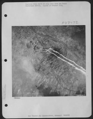 Consolidated > Bombs Burst On The Target At Schweinfurt, Germany, As The Smoke Markers Still Reach Up Into The Sky.  13 April 1944.