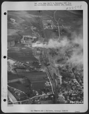 Thumbnail for Consolidated > Bombs Burst On Weilheim Marshalling Yards, Germany During A Bomb Raid By 14Th Fighter Group.  Note - Lockheed P-38 Lightning In Photo.  19 April 1945.