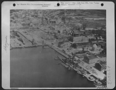 Thumbnail for Consolidated > Wilhelmshaven'S Shipyards In Ruins -- Wilhelmshaven'S Shipyards Show The Wreckage Wrought By Planes Of The Us 8Th Af During The Strategic Bombing Campaign.  The German Curiser 'Koln' Lies In The Basin, A Sunken Wreck.  Germany.