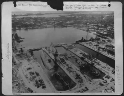 Consolidated > Wilhelmshaven'S Shipyards Wrecked -- Air Photos Taken By Cres Of The Us 8Th Af Show The Wreckage Heaped On Ship Building Yards At Wilhelmshaven, Germany, The First And One Of The Last Targets Hit By The 8Th Af.  Ships Partly Sunk, Wrecked Cranes, Bombed R