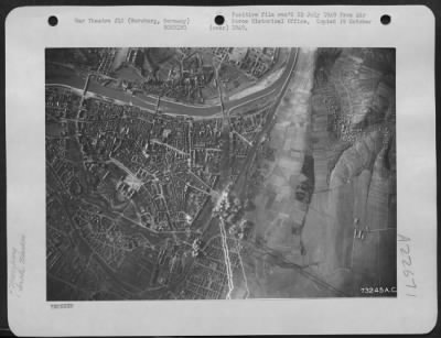 Thumbnail for Consolidated > The Target Markers Are Still Visible As Bombs Burst On Enemy Installations At Wurzburg, Germany.  23 Feb. 1945.