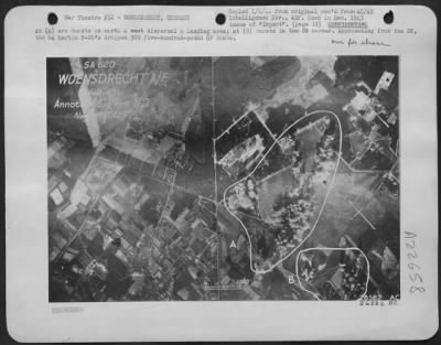 Thumbnail for Consolidated > At (A) are bursts on north & west dispersal & landing area; at (B) bursts in the SW corner. Approaching from the SW, the 64 Martin B-26's dropped 209 five-hundred-pound GP bombs.