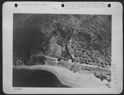 Thumbnail for Consolidated > Easy recognition by attacking commando troops is the purpose of this shot of a railway tunnel in Italy.