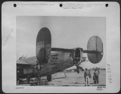 Consolidated > ITALY-Its tail turret completely shot off, this Consolidated B-24 Liberator bomber limped home from Munich on October 4, 1944. Rudders and Fuselage were riddled by flak bursts, and two crewmen were killed and one critically wounded. The injured man