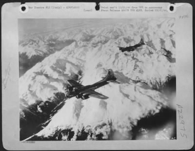 Consolidated > These two planes, high above the craffy winter Alps in northern Italy, are Boeing B-17 Flying Fortresses of Maj. Gen. Nathan F. Twining's U.S. Army 15th Air Force.