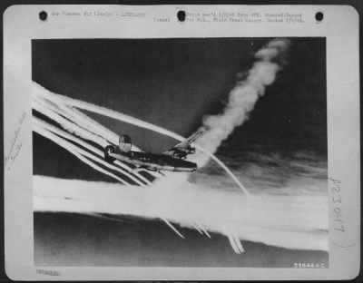 Thumbnail for Consolidated > ITALY--Consolidated B-24 Liberators head for Vienna, Austrial S/Sgt. Richard L. Troger, of Hutchinson, Kan., 15th Air Force Aerial Photographer, took this picture of vapor trails from the attacking formation. Diagonal vapor trails are from Lockheed