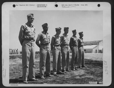 Thumbnail for Consolidated > These six officers of a Bomb Group in Italy were awarded the Distinguished Flying Cross by Maj. Gen. Nathan F. Twining, Commanding General of 15th Air Force. Left to right: Col. Charles A. Clark, Jr., 228 Prinera Drive, San Antonio, Tex., Capt. Frank