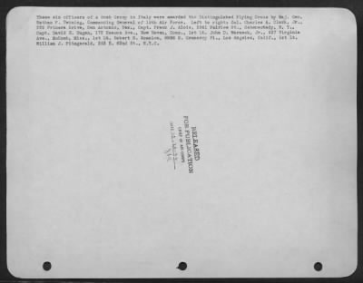 Consolidated > These six officers of a Bomb Group in Italy were awarded the Distinguished Flying Cross by Maj. Gen. Nathan F. Twining, Commanding General of 15th Air Force. Left to right: Col. Charles A. Clark, Jr., 228 Prinera Drive, San Antonio, Tex., Capt. Frank