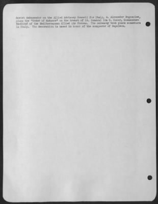 Consolidated > Soviet Ambassador on the Allied Advisory Council for Italy, M. Alexander Bogomolov, pines the "Order of Kutuzov" on the breast of Lt. General Ira C. Eaker, Commander-In-Chief of the Mediterranean Allied Air Forces. The ceremony took place somewhere