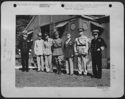 Consolidated > ITALY-The Mediterranean Allied High Command after ceremony at which Major General John K. Cannon, Commanding General of the 12th Air Force, was presented with the Order of Knight Commander of the American Navy in the Mediterranean; Lt. Gen.