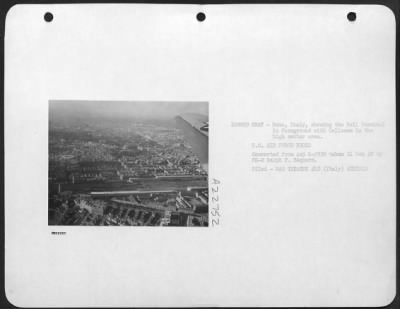 Thumbnail for Consolidated > Rome, Italy, Showing The Rail Terminal In Foreground With Coliseum In The High Center Area.