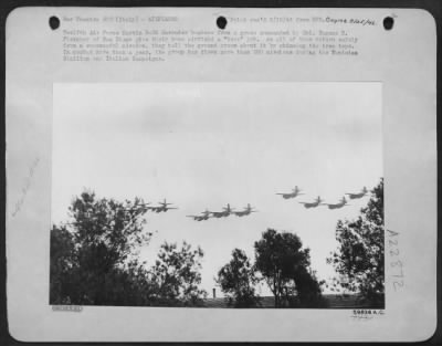 Consolidated > 12Th Af Martin B-26 Marauder Bombers From A Group Commanded By Colonel Eugene B. Fletcher Of San Diego Give Their Home Airfield A 'Buzz' Job.  As All Of Them Return Safely From A Successful Mission, They Tell The Ground Crews About It By Skimming The Tree