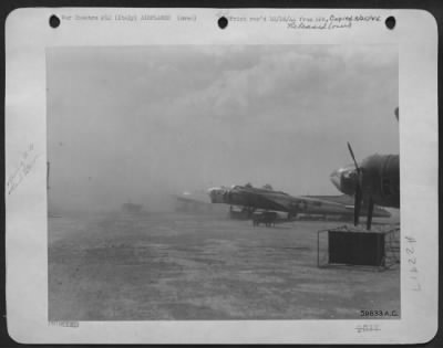 Thumbnail for Consolidated > Italy - Ground Crews Have To Cover Up Quickly -- And The Engine First -- When A Dust Storm Begins.  One Dust Storm Stifled Production For The Better Part Of Two Days At An Advanced Airbase Of The 15Th Air Force Service Command.  There Is Nothing To Do But