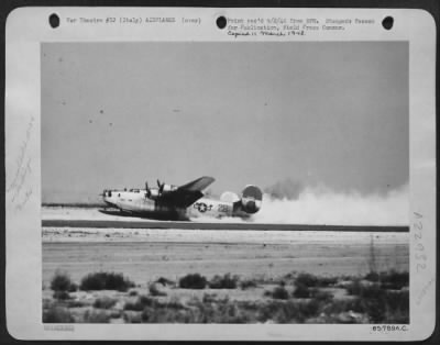 Thumbnail for Consolidated > While Flying As Part Of The 15Th Af Consolidated B-24 Liberator Formation That Attacked Targets At Ploesti, Rumania, This Liberator Was Hit By Flak, And Is Shown Here As It Belly Landed At Its Base In Southern Italy.  451St Bomb Group.