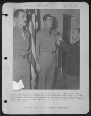 Thumbnail for Consolidated > 1St Lt. George R. Gibson Of Salem, Ohio Was Presented With The Distinguished Flying Cross For Extraordinary Achievement While Participating In Aerial Flight.  Lt. Gibson, Is Shown Having The Coveted Award Pinned On By Colonel John W. Monahan, 12Th Aaf Chi