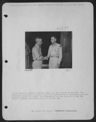 Thumbnail for Consolidated > 1St Lt. Richard H. Hecker, Detroit, Mich., Has Been Awarded The Air Medal 'For Meritorious Achievement In Aerial Flight While Participating In Sustained Operational Activities Against The Enemy'.  The Presentation Was Made Personally By Major General Nath