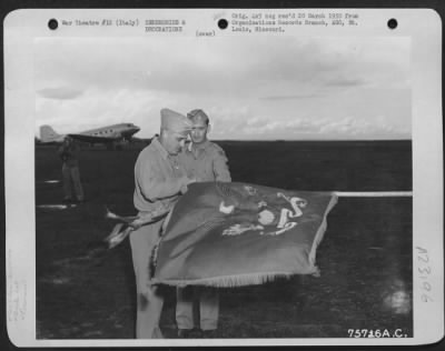 Consolidated > Major General Nathan F. Twining Presents 3Rd Unit Citation To The 1St Fighter Group During Ceremonies At An Airfield Somewhere In Italy.