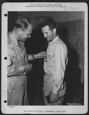 Thumbnail for Consolidated > Capt. Harry R. Oakley Of The 90Th Photo Reconn Wing, Is Presented The Legion Of Merit By Colonel Karl Polifka During A Ceremony At An Air Base Somewhere In Italy.